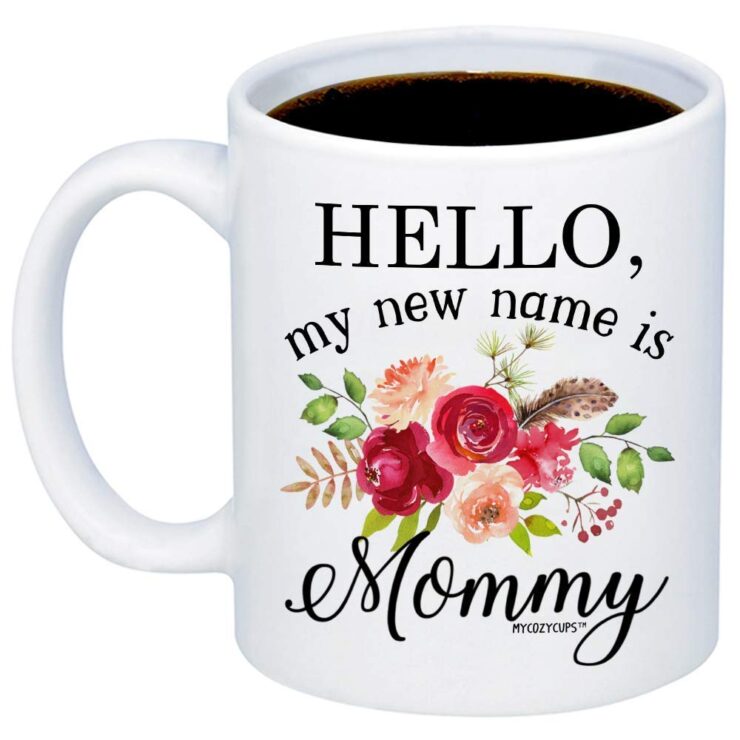 MyCozyCups Gift For Expecting Moms - Hello My New Name Is Mommy Coffee Mug - Unique Baby Reveal 15oz Cup For New Mothers, Parents, Pregnant Moms To Be - Pregnancy Announcement Surprise Photo Prop